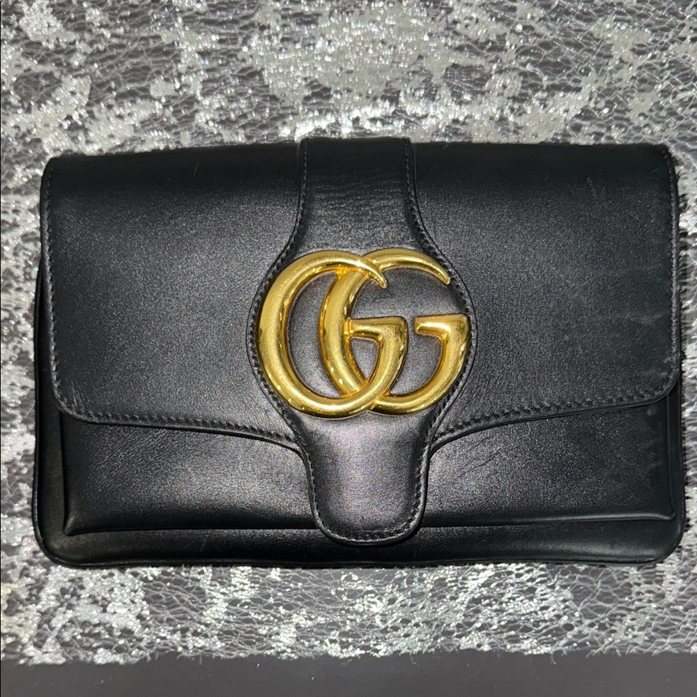 Gucci Black and Gold Clutch with Iconic GG Logo
